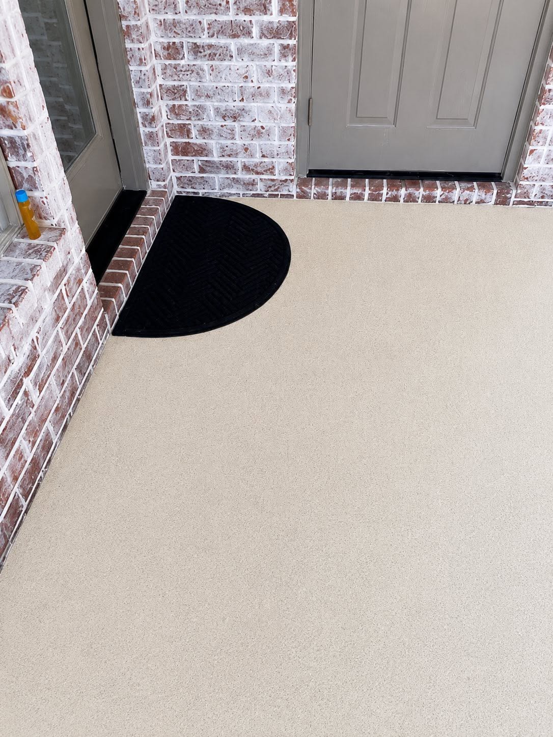 Clean front porch after pressure washing